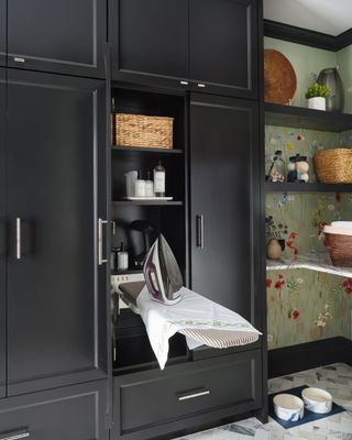 Black cabinet, tiled floor, black shelves
