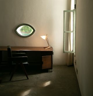 room with eye-shape window