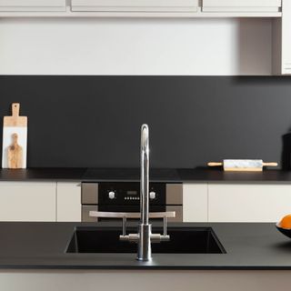 kitchen area with black worktop