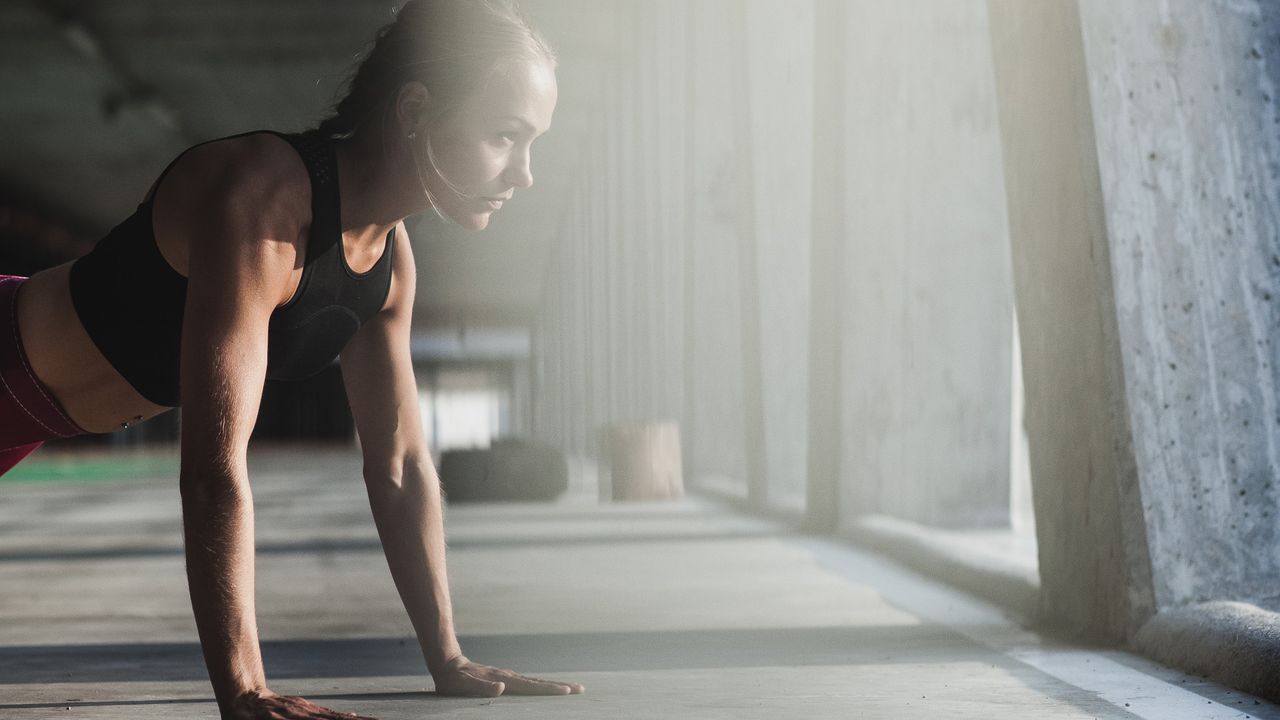 Woman doing high plank