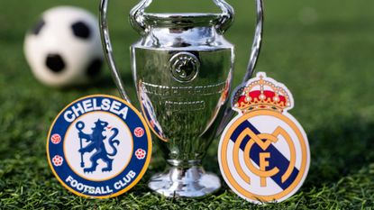 The UEFA Champions League Cup and the emblems of the football clubs Real Madrid CF and Chelsea F. C
