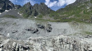 A swinging bridge over a glacier in the Alps