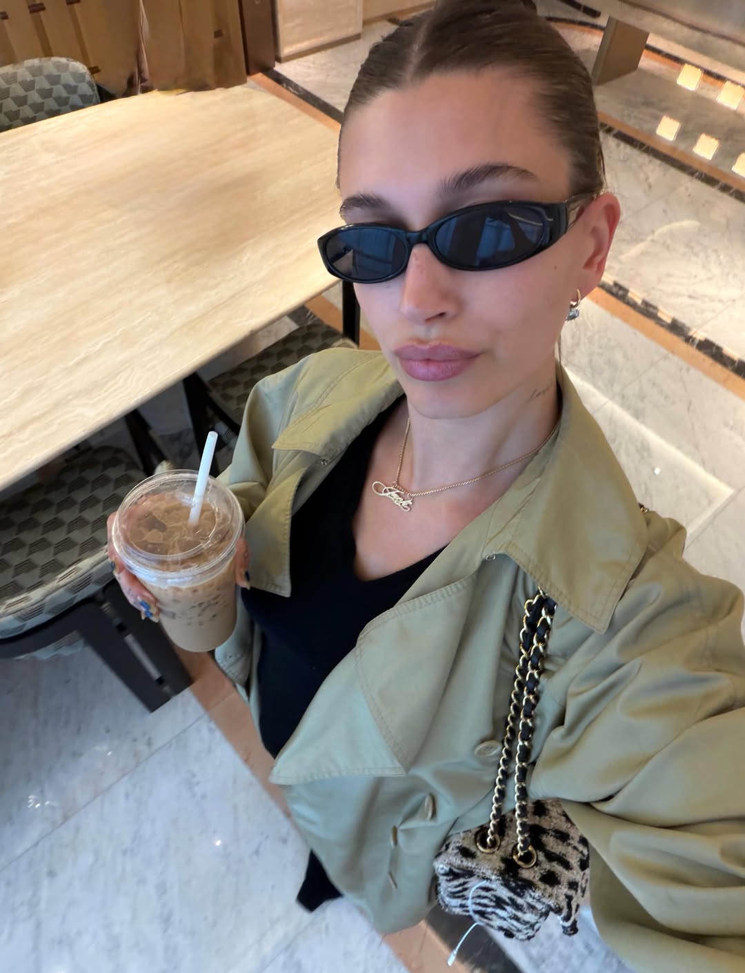 Hailey Bieber's Seoul Style Includes Two Chanel Bags, a Sheer Crochet Top, and Her Favorite Heeled Flip-Flops