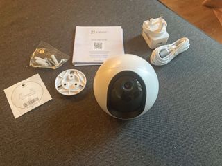 Ezviz C6 2K+ Security Camera components displayed side by side