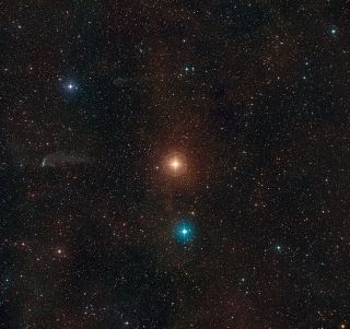 This wide view image from the European Southern Observatory's Digital Sky Survey shows the region around the red giant star L2 Puppis, which is about 200 light-years from Earth.