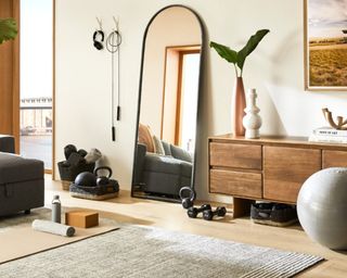 A living room with multipurpose gym storage baskets and ottomans