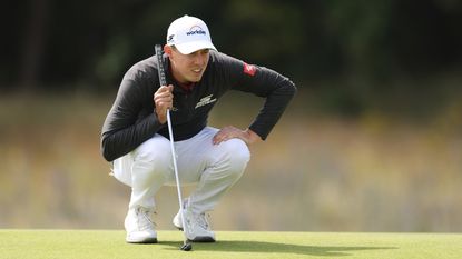 Matt Fitzpatrick lines up a putt