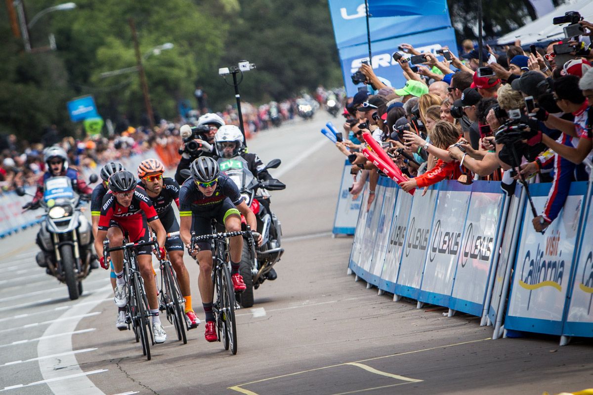 Fans cheer as the break passes through on another lap