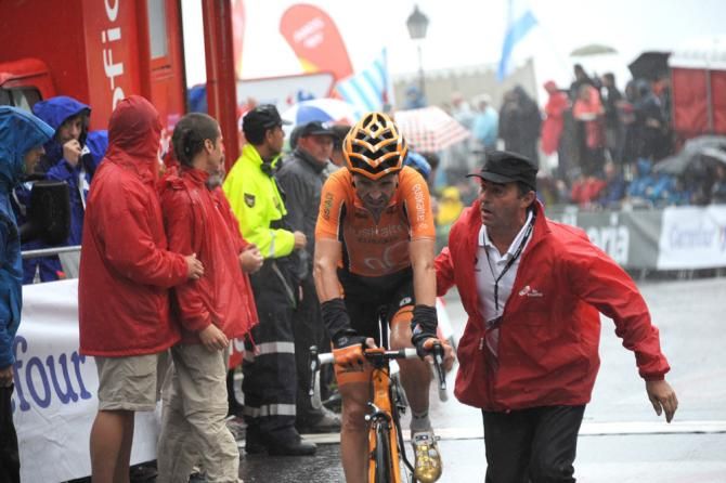 A totally spent Sammy Sanchez (Euskaltel-Euskadi) is helped at the finish line