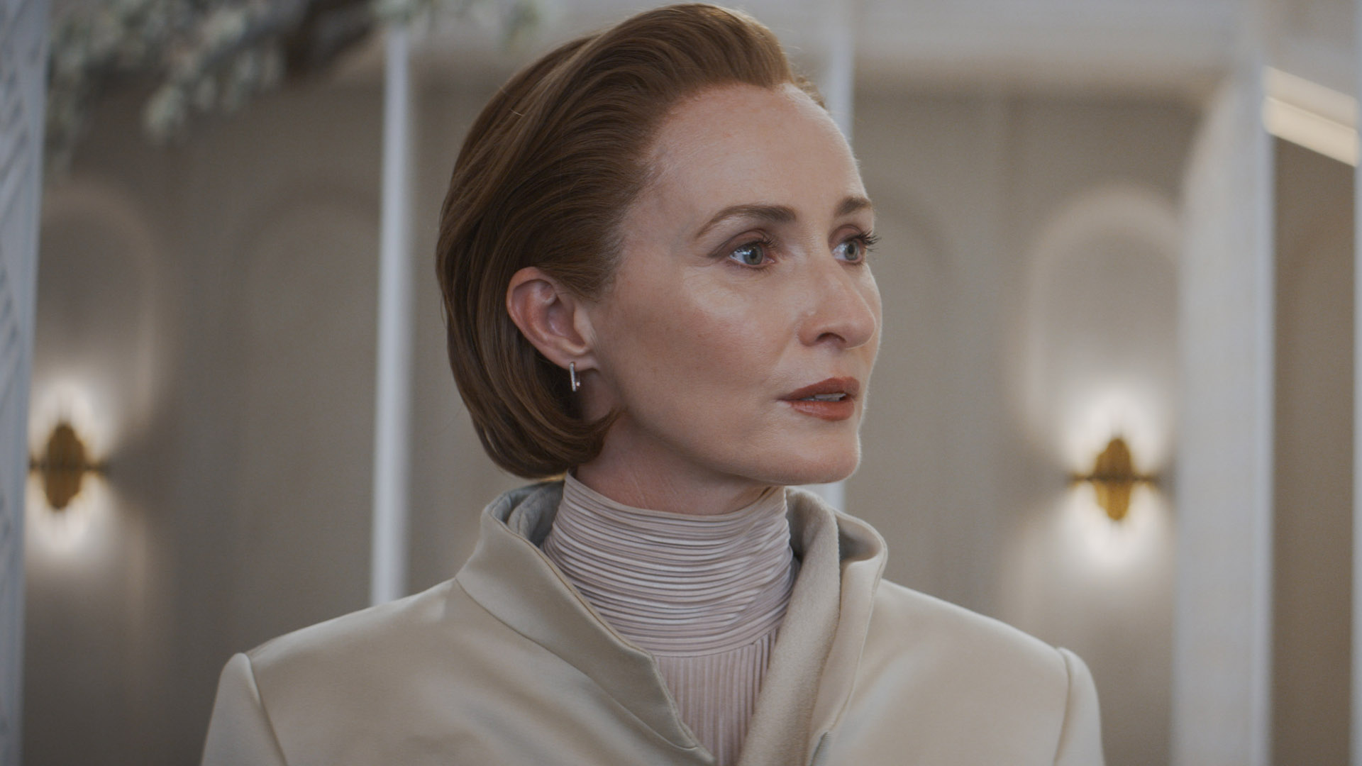 Mon Mothma looks at her husband, who is standing off camera, in Andor on Disney Plus