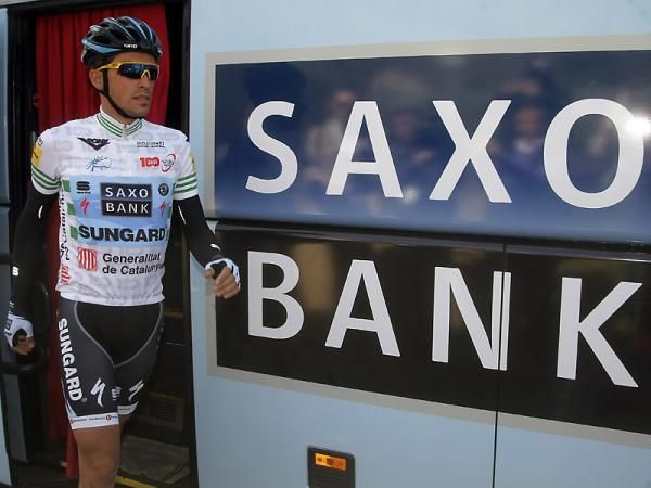 Race leader Alberto Contador steps off his team bus.