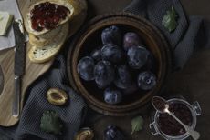 A picture of plums in a bowl used to make a homemade plum jam recipe