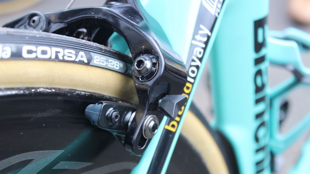 It looks like the mechanic has glued on an adjustment knob to the direct-mount brakes so that they can be balanced on the fly