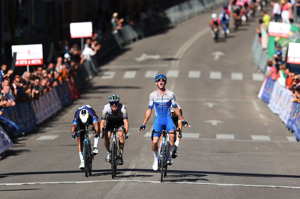 SORIA SPAIN JULY 26 Felix Engelhardt of Germany and Team JaycoAlUla celebrates at finish line as stage winner ahead of LR Ivn Garca Cortina of Spain and Team Movistar Alessandro Fedeli of Italy and Team Q365 and Alex Molenaar of The Netherlands and Team Electro Hiper Europa during the 37th Vuelta a Castilla Y Leon 2023 Stage 1 a 1689km stage from Soria to Soria on July 26 2023 in Soria Spain Photo by Gonzalo Arroyo MorenoGetty Images