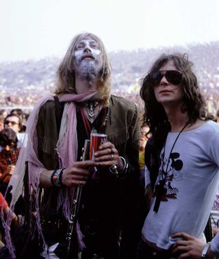 Nik Turner and Tim Blake of Hawkwind in the audience on the first day of the 1970 Isle of Wight Festival at Afton Down on the Isle of Wight, England on 26th August 1970.