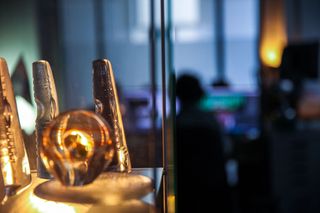 Lux Aeterna AI tools; awards on the shelf in a VFX studio