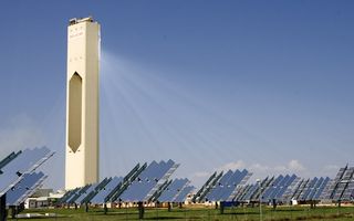 At the PS10 solar plant near Seville, Spain, a field of heliostats concentrates sunlight onto a central tower.