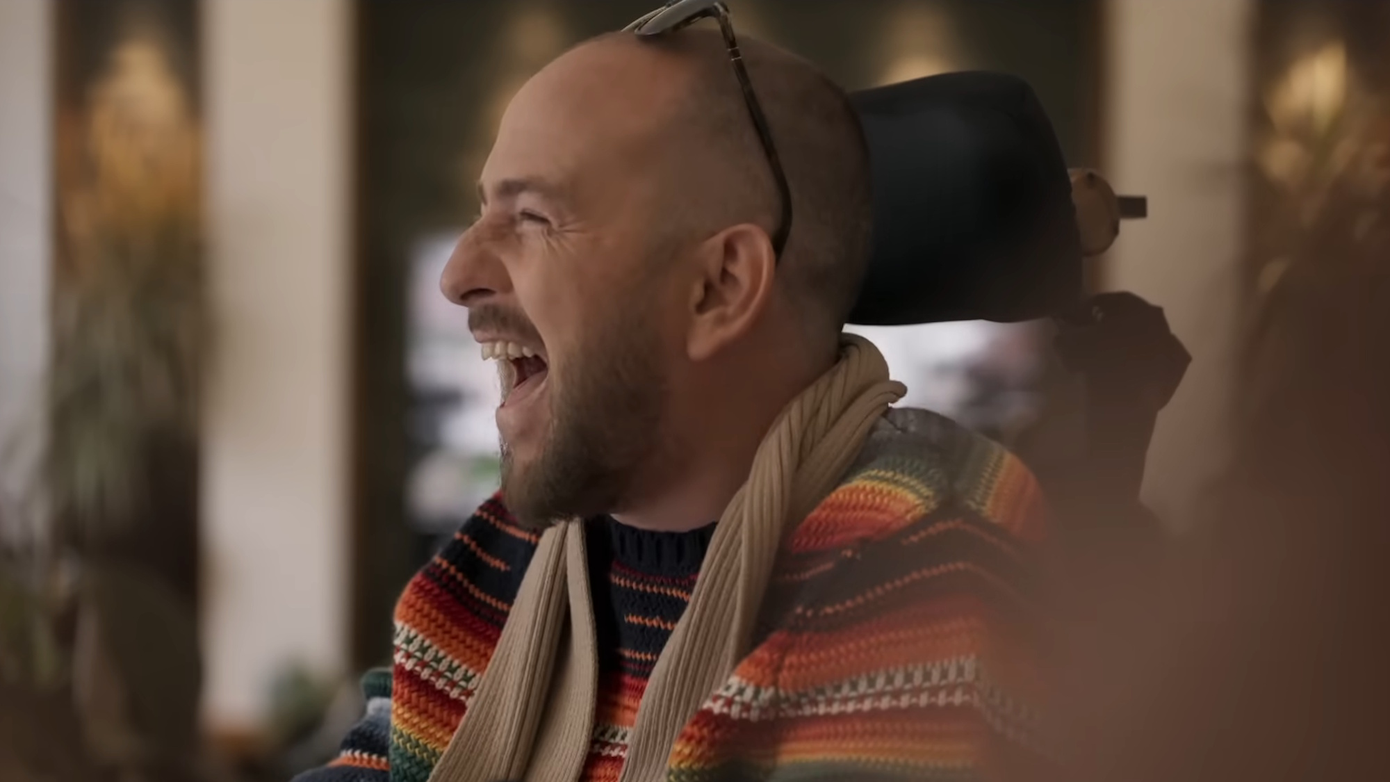 David Holmes is shown laughing in the documentary David Holmes: The Boy Who Lived.