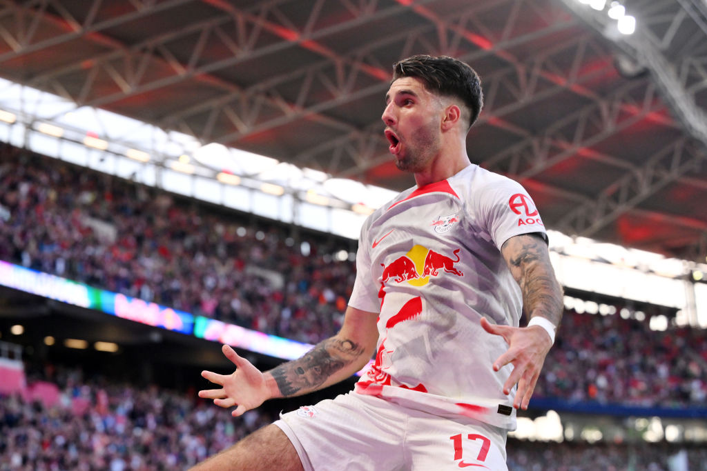 Dominik Szoboszlai of RB Leipzig celebrates after scoring the team's second goal during the Bundesliga match between RB Leipzig and SV Werder Bremen at Red Bull Arena on May 14, 2023 in Leipzig, Germany.