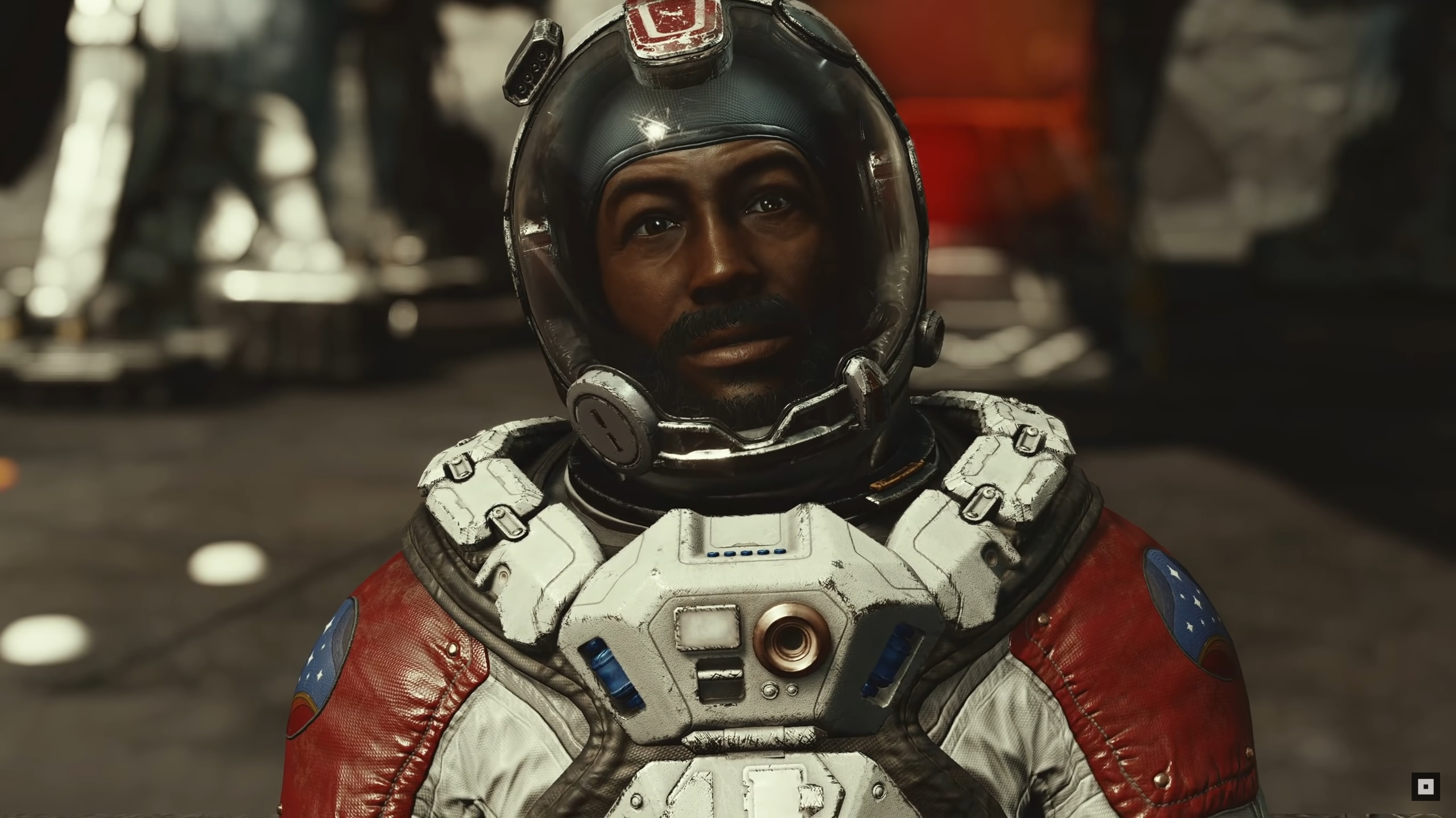Starfield - A Constellation member in a red and white space suit and clear helmet.