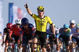 BIMMAH SINK HOLE, OMAN - FEBRUARY 08: Olav Kooij of Netherlands and Team Visma | Lease a Bike celebrates at finish line as stage winner ahead of Pavel Bittner of Czech Republic and Team Picnic PostNL and Erlend Blikra of Norway and Team Uno-X Mobility during the 14th Tour of Oman, Stage 1 a 177.7km stage from Bushar to Bimmah Sink Hole on February 08, 2025 in Bimmah Sink Hole, Oman. (Photo by Alex Broadway/Getty Images)