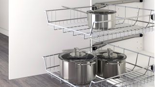 Wire basket cupboard pan storage