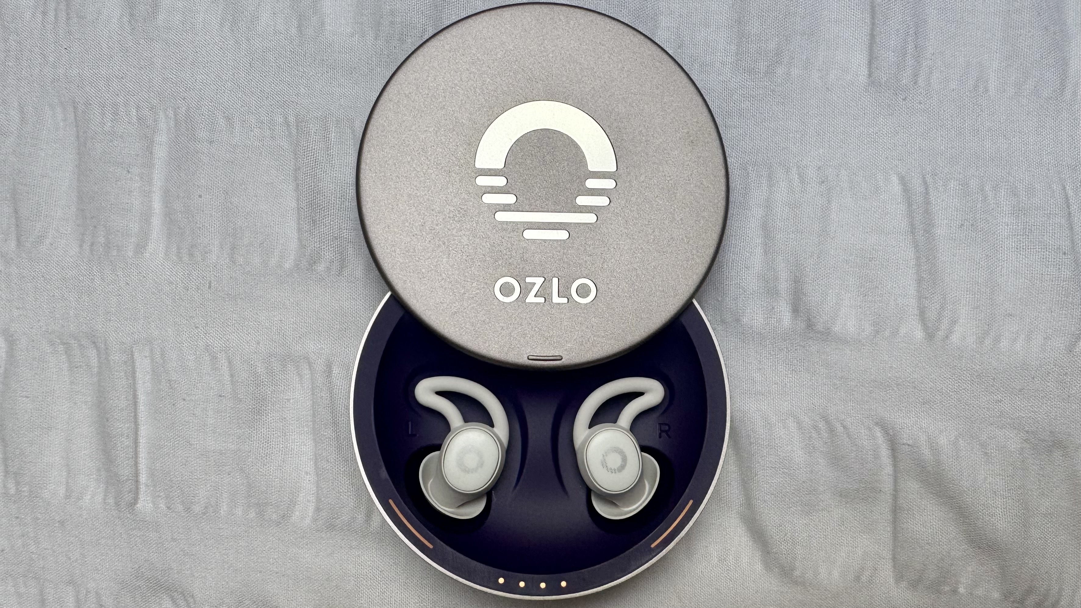 White Ozlo Sleepbuds in purple case