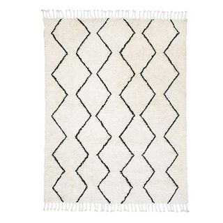 african benni rug with geometric design and white background