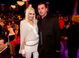 Gwen Stefani (L) and Gavin Rossdale attend the PEOPLE Magazine Awards at The Beverly Hilton Hotel on December 18, 2014 in Beverly Hills, California.