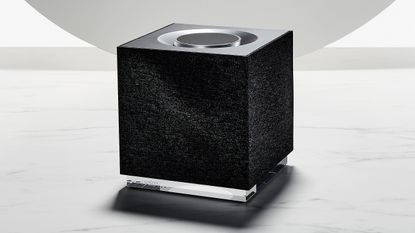Naim Mu-so Qb 2 review, speaker sits on marble surface with pale grey background