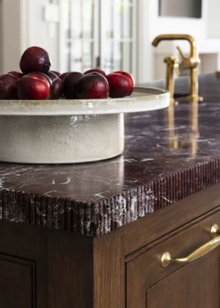 Close up of the fluted detailing on a marble countertop