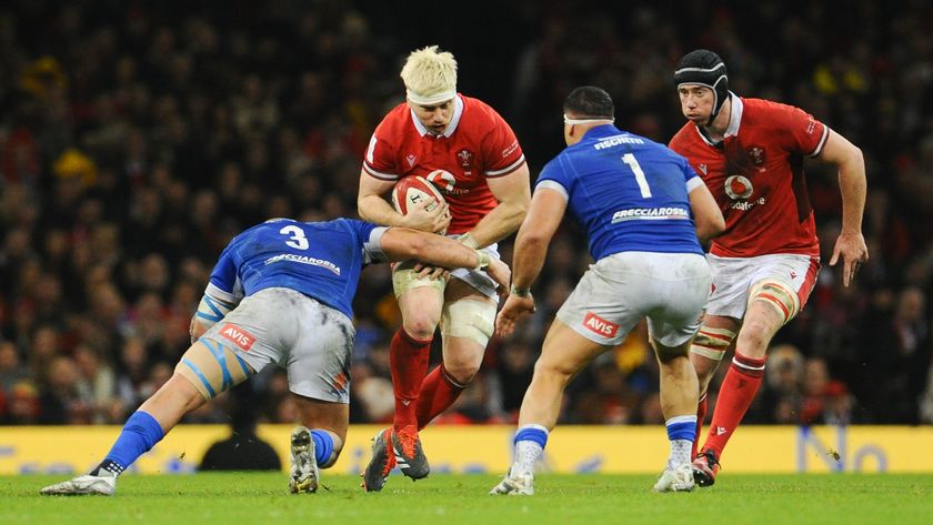 Two Italy and two Wales players battle for the ball during Italy vs Wales in the Six Nations 2024