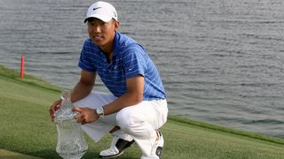 Anthony Kim with the trophy after his 2010 win at the Shell Houston Open