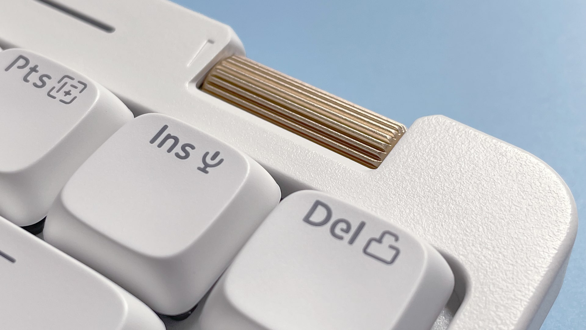 The Lofree Flow Lite mechanical keyboard against a blue background.