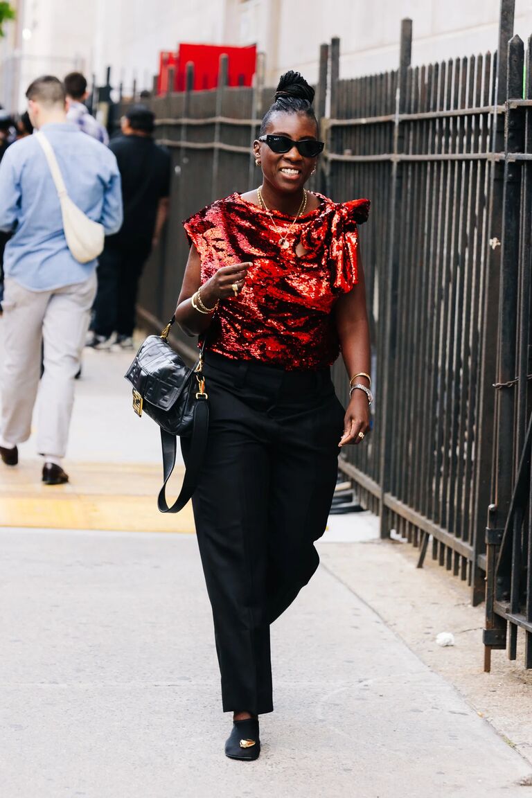 Nikki Ogunnaike wearing a sequin shirt on the street