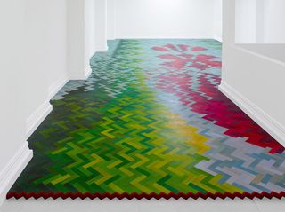 colourful floor and white walls