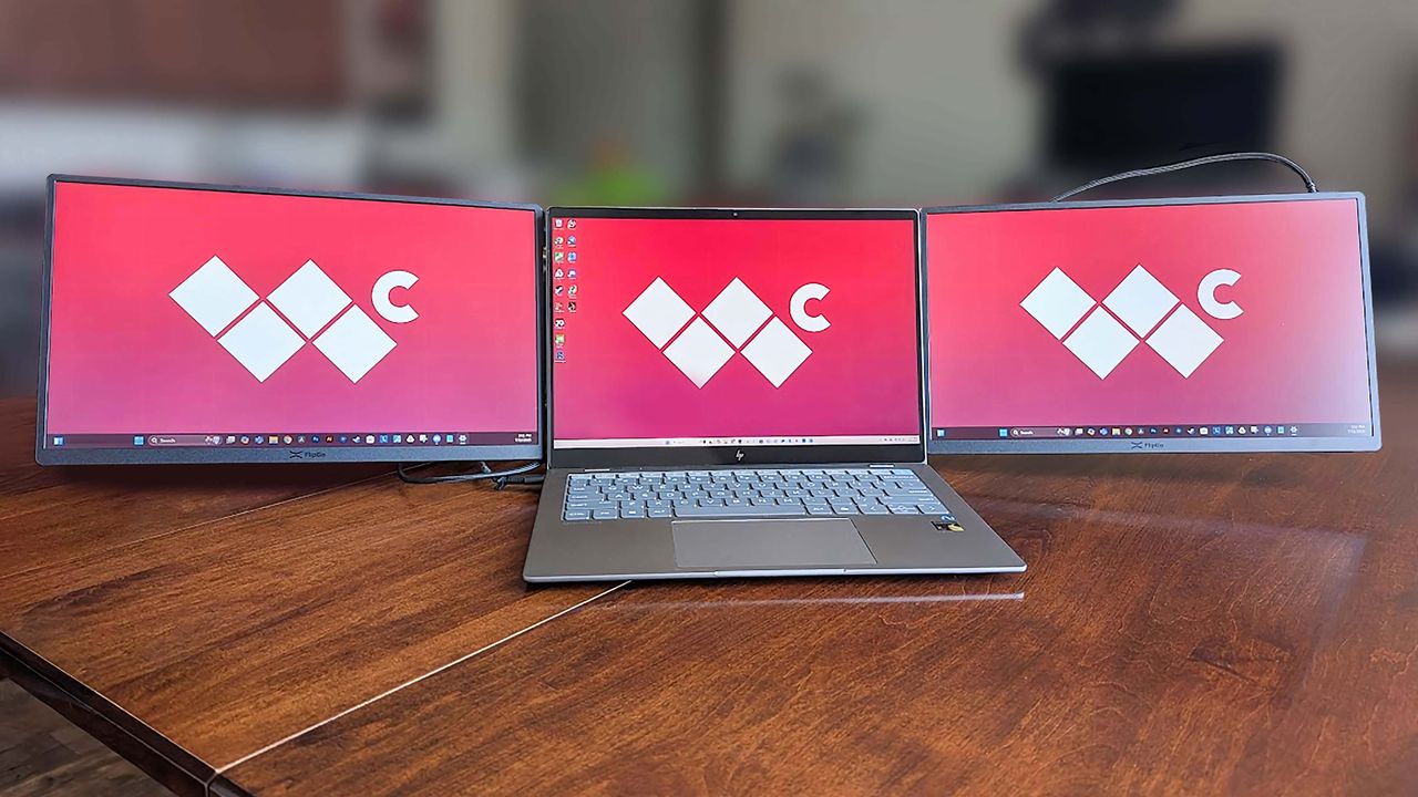 JSAUX FlipGo Horizon attached to a laptop with all three displaying the Windows Central logo in landscape orientation.