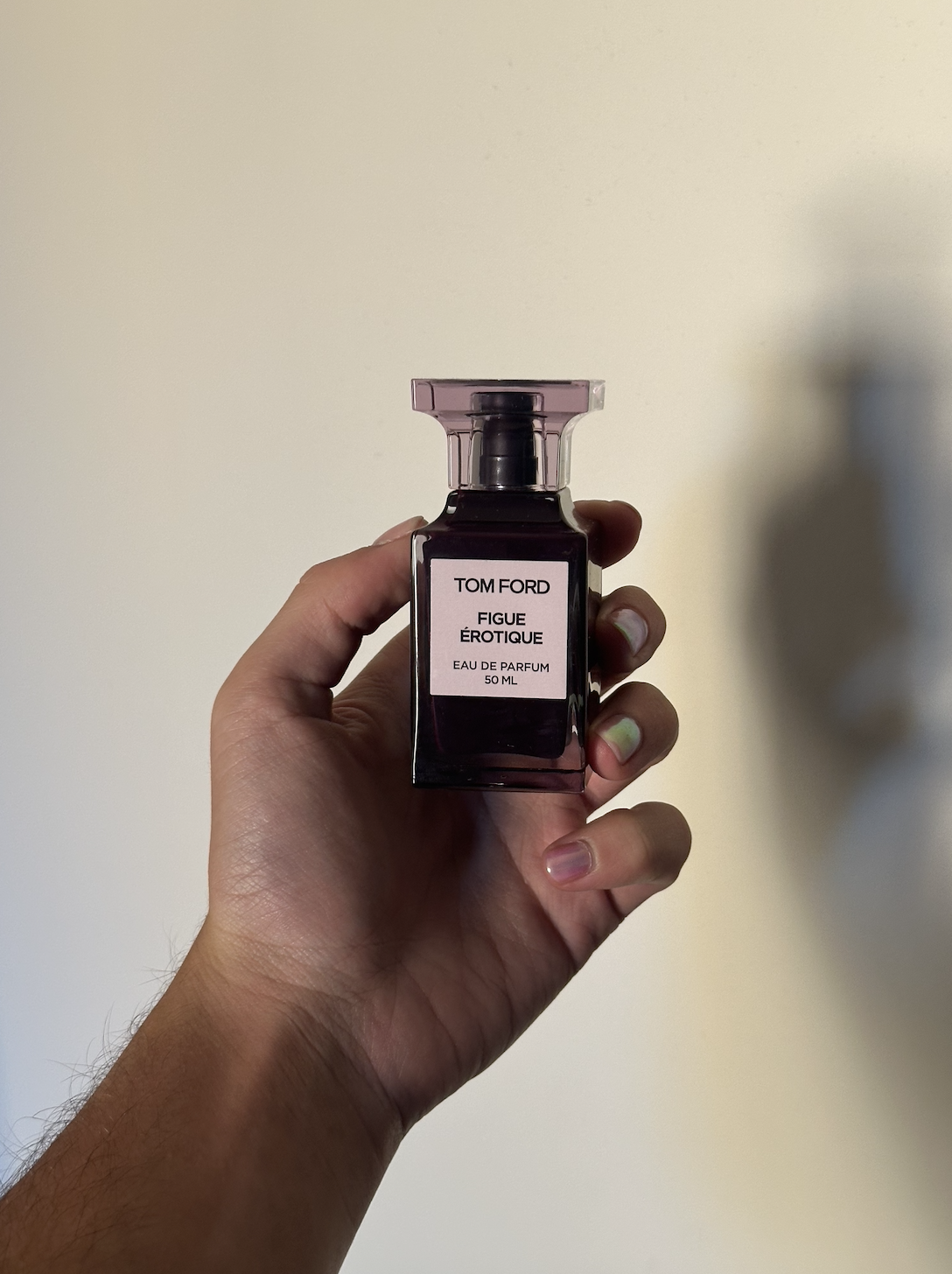 David Evan Ruff holding Tom Ford Figue Erotique