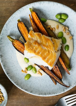 Pan fried cod with roasted carrots