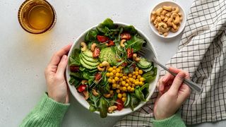 A healthy plant-based lunch, containing chickpeas, avocado and cashew nuts