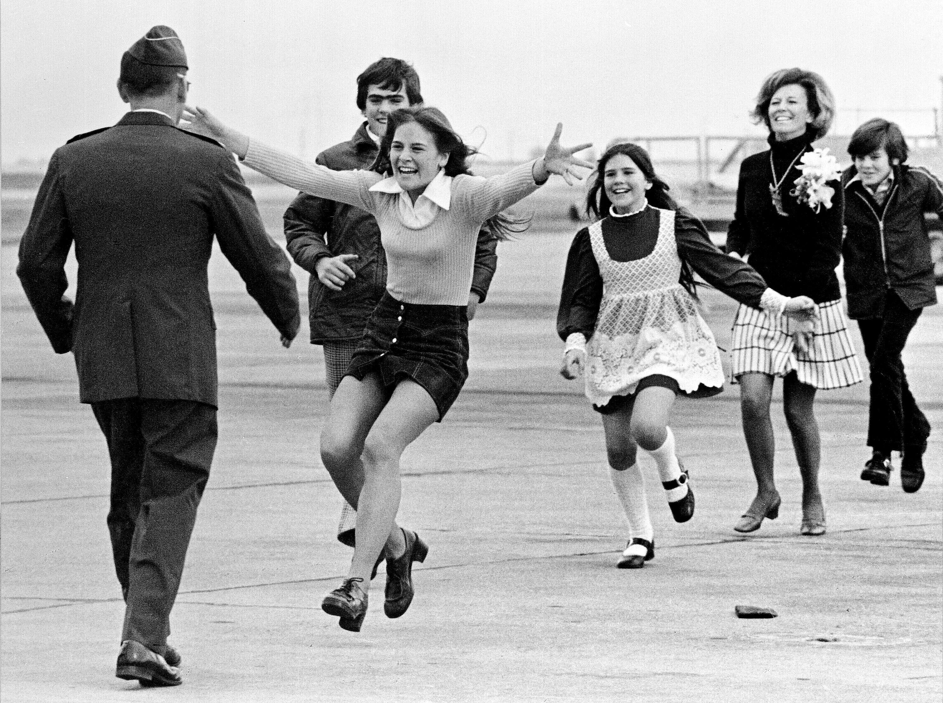 3FCB1J2 FILE - Released prisoner of war Lt. Col. Robert L. Stirm is greeted by his family at Travis Air Force Base in Fairfield, Calif., as he returns home from the Vietnam War, March 17, 1973. (AP Photo/Sal Veder, File)