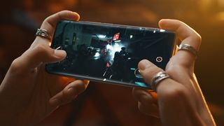 Someone playing a game on a Realme 10 Pro Plus