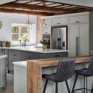 kitchen with grey counter and chairs