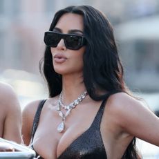 Kim Kardashian wearing a vintage Versace gown made from chainmail and lace in Venice