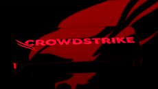 Close-up shot of the CrowdStrike logo and branding pictured on a smartphone screen, with company icon in background.