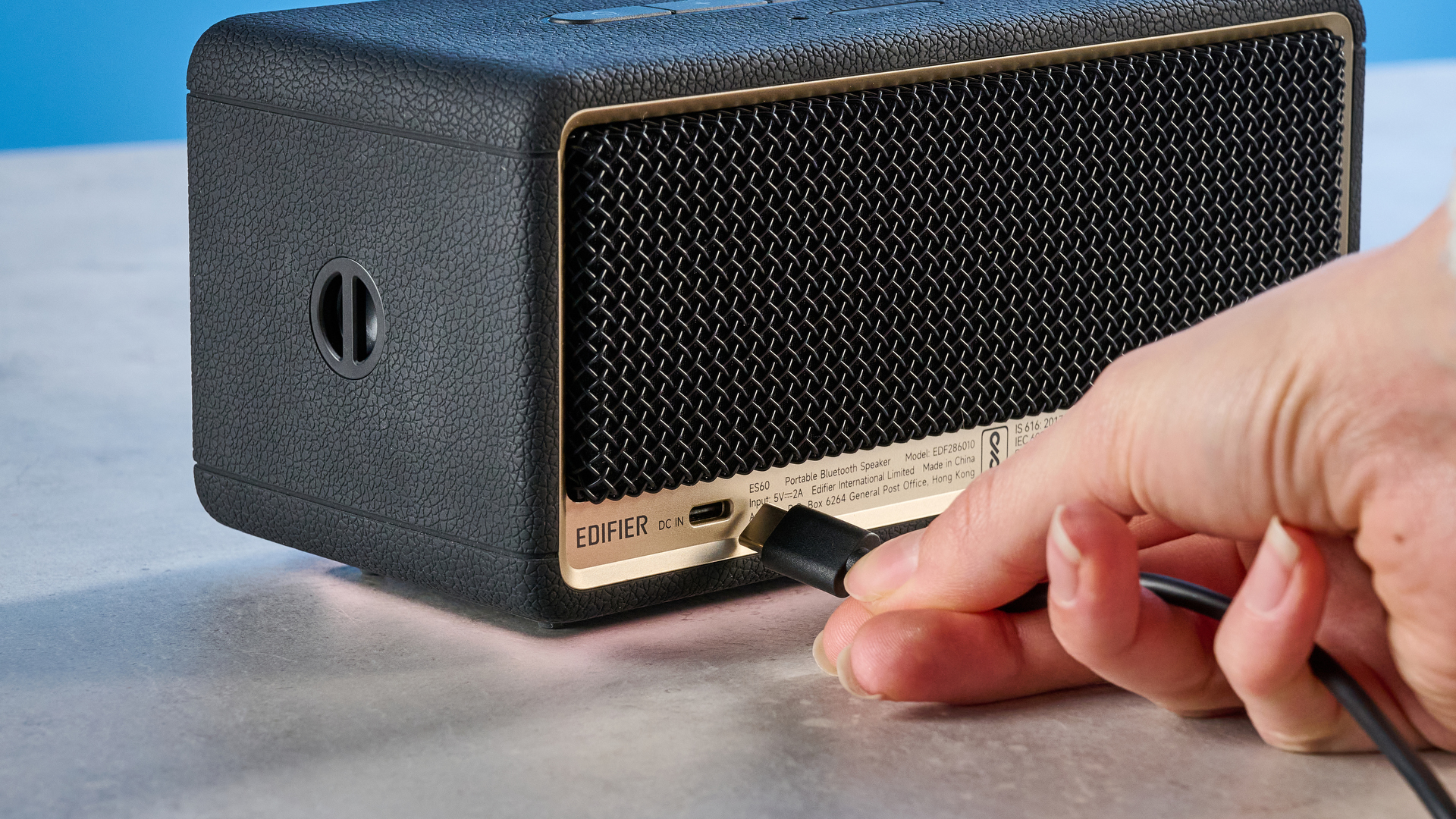 A black Edifier ES60 Bluetooth speaker