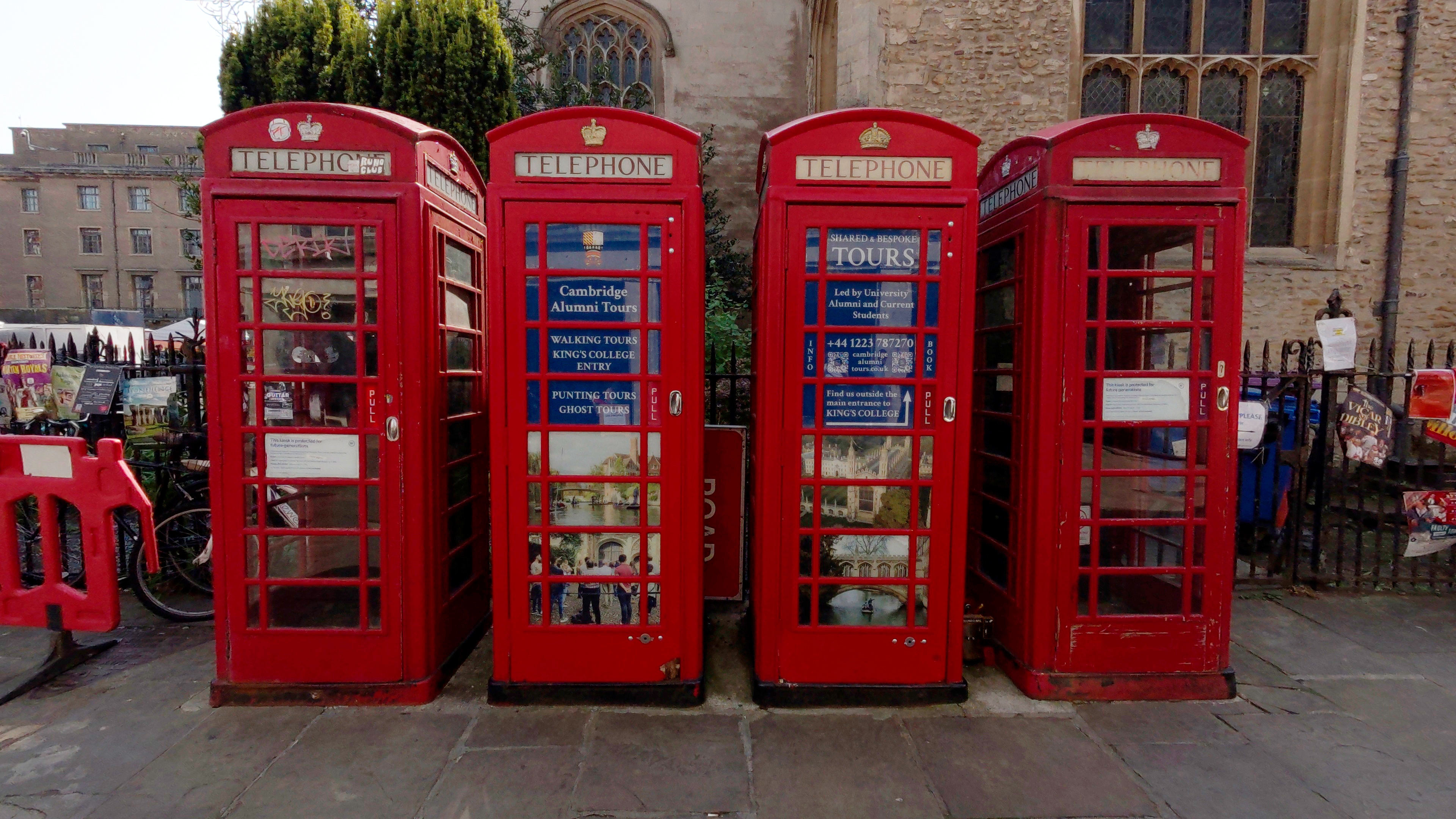 Photo of traditional red phone boxes taken with the QooCam 3 Ultra