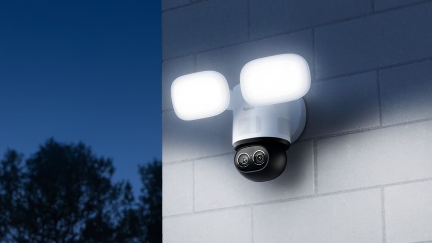 Reolink TrackFlexFloodlight WiFi camera mounted on exterior wall