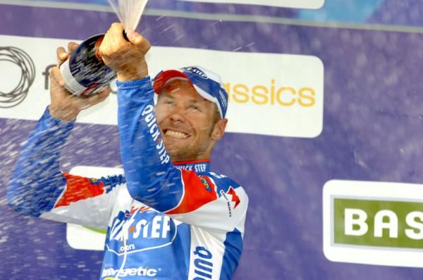 Tom Boonen (Quick Step) sprays the crowd with Champaign