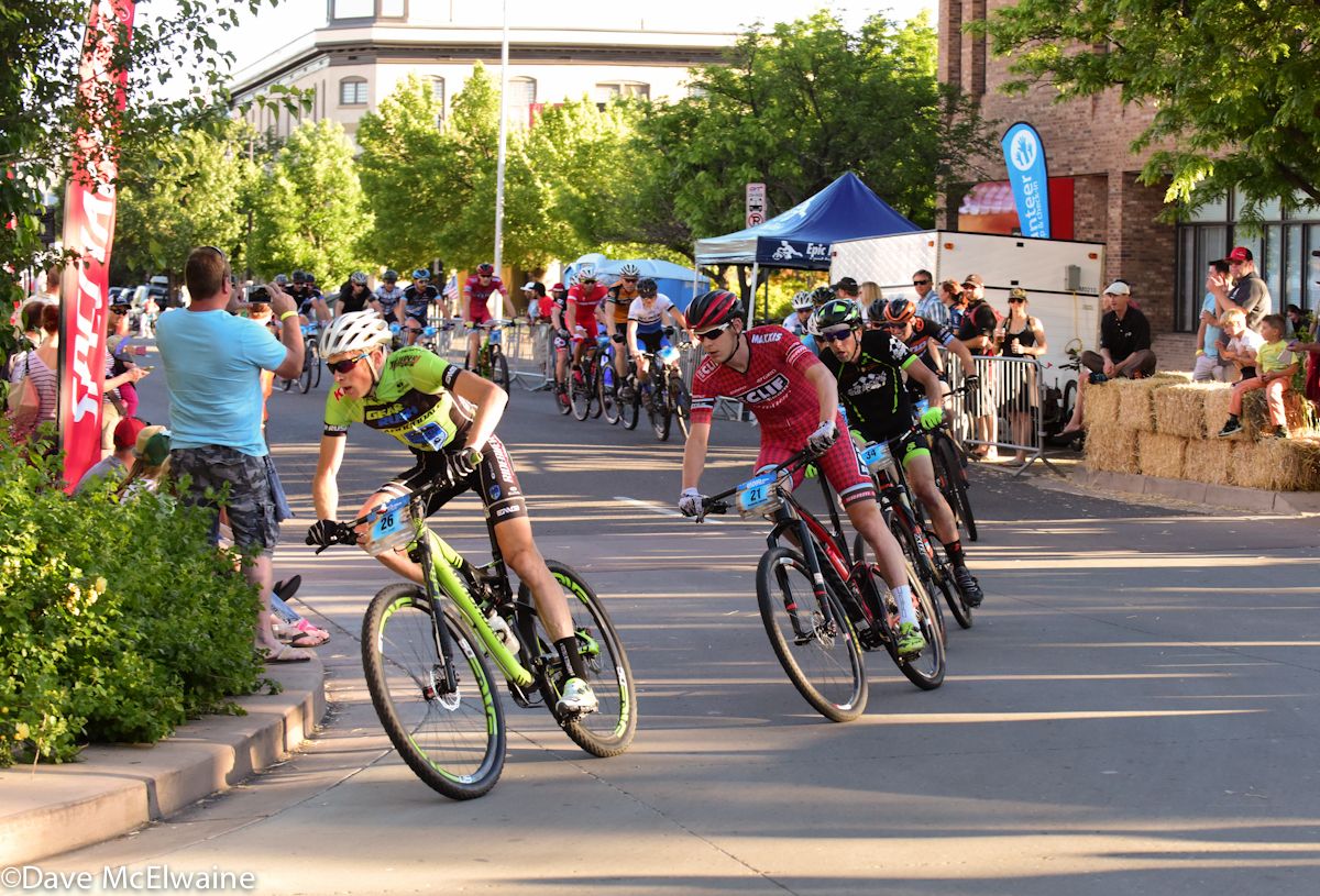 Alex Grant (Ridebiker Alliance) leading a large chase group with Ben Sonntag following